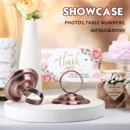 MotiMind 24 Pcs Table Number Holders-Metal Place Card Holders Table Number Stands Tabletop Sign Stands for Photos, Menu, Memo, Notes, Wedding, Restaurant, Banquet, Birthday(Antique Copper) - color: Antique Copper